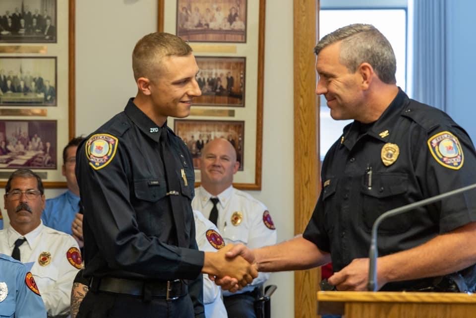 IMG_9079 Officer Dylan Ousley (left), joining the Zeeland Police Department.