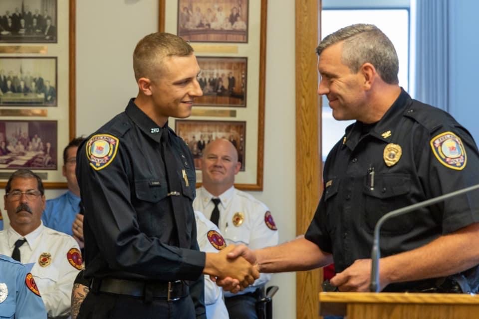 Officer Dylan Ousley (left), joining the Zeeland Police Department.